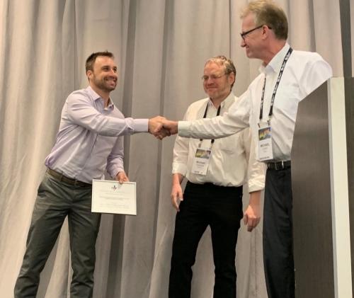 Jones receiving Most Influential Paper award at ASE 2019.